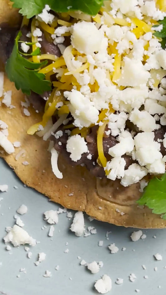 Crispy Tostitos with Beans and Cheese